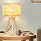 This lamp takes a tripod design more commonly seen on floor lamps, and moves it to your table. It even comes with an LED bulb.